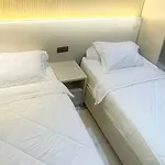Urbanview Hotel Wollangi Syariah Near Toko Alaska Makassar